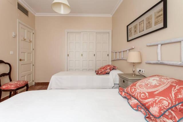 Postel nebo postele na pokoji v ubytování Apartamento Plaza Nueva