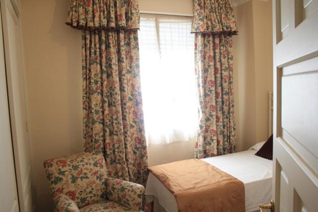 Postel nebo postele na pokoji v ubytování Apartamento Plaza Nueva