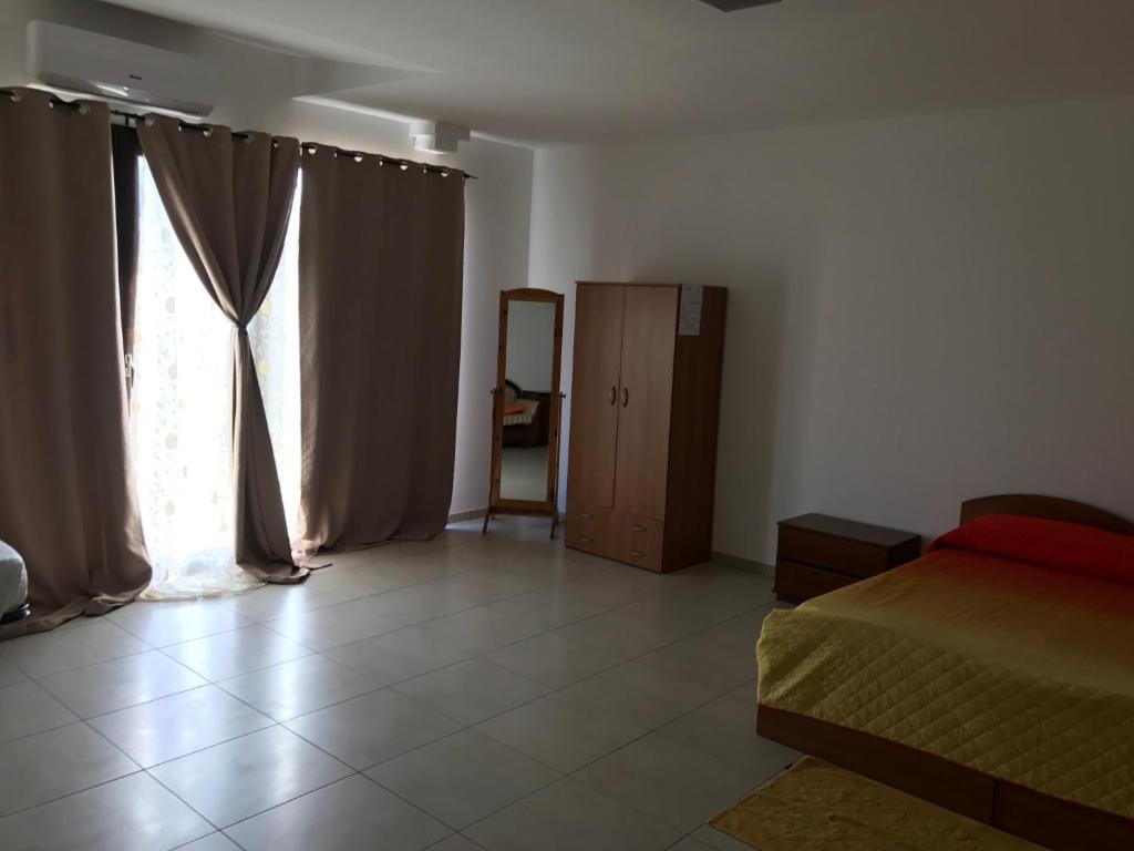 Łóżko lub łóżka w pokoju w obiekcie Valle Chiara