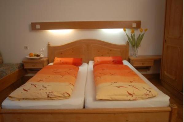 Postel nebo postele na pokoji v ubytování Hotel Andreas Hofer