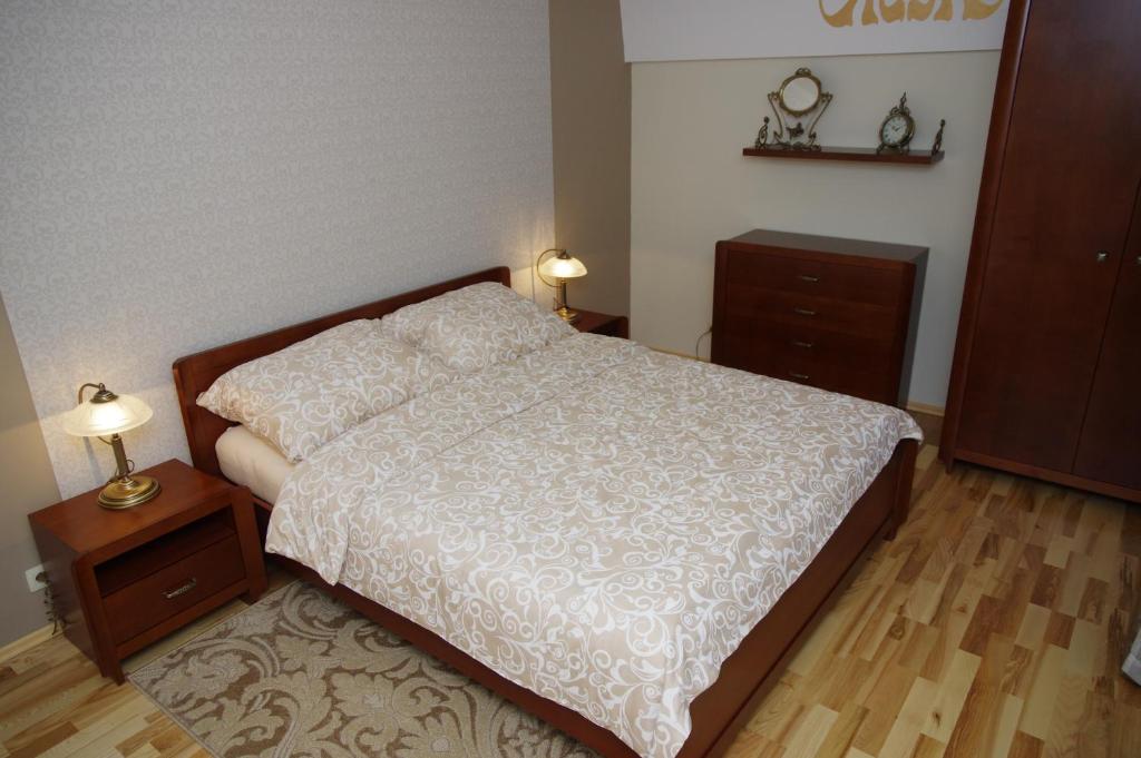 Postel nebo postele na pokoji v ubytování Vilka Marticus