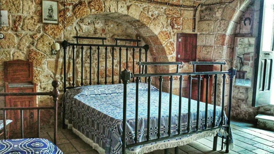 Postel nebo postele na pokoji v ubytování B&B Pergulea