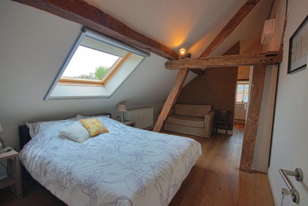 Postel nebo postele na pokoji v ubytování B&B Crijbohoeve
