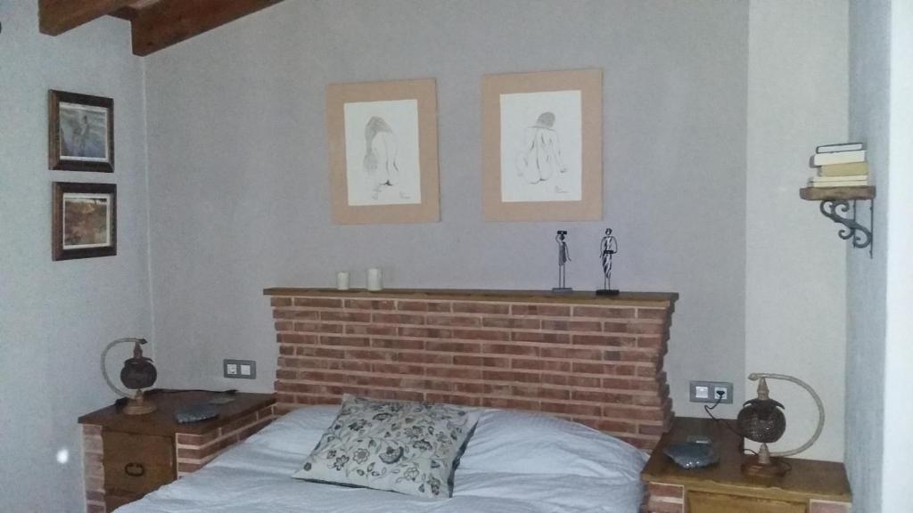 Posteľ alebo postele v izbe v ubytovaní Dayma
