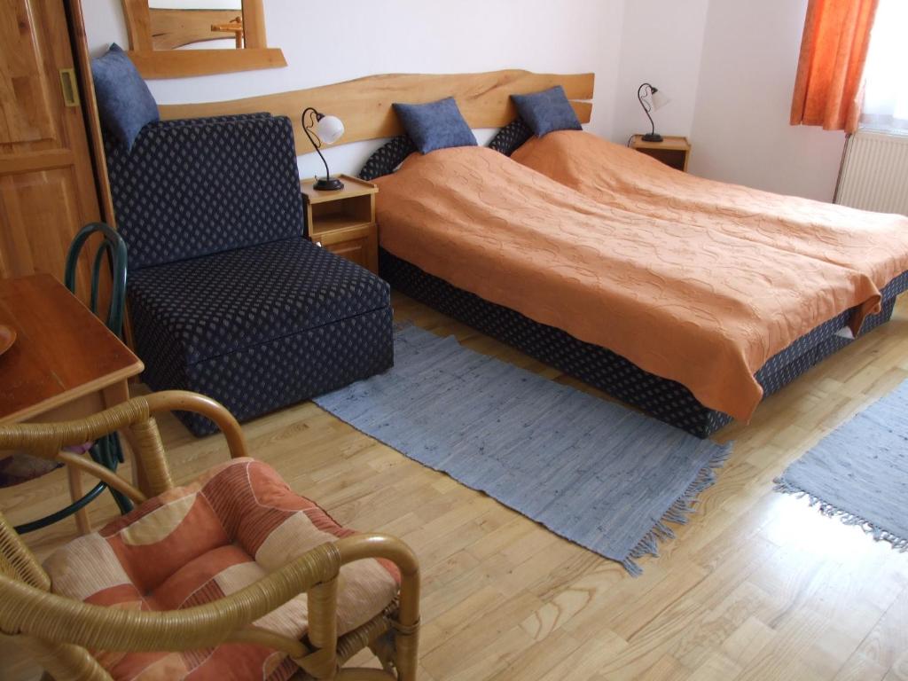 Postel nebo postele na pokoji v ubytování Hotel Diána