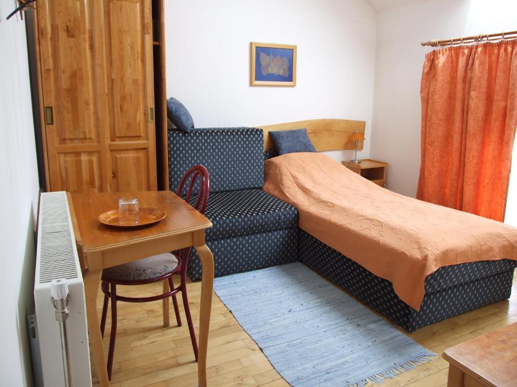 Postel nebo postele na pokoji v ubytování Hotel Diána