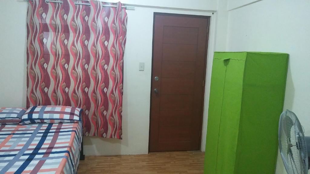 Letto o letti in una camera di Budget Studio Unit in Makati