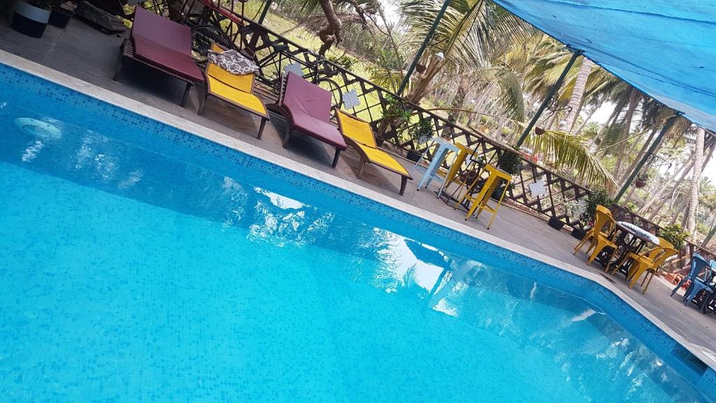 Bazén v ubytování Casa Menezes - A Heritage Goan Homestay nebo v jeho okolí