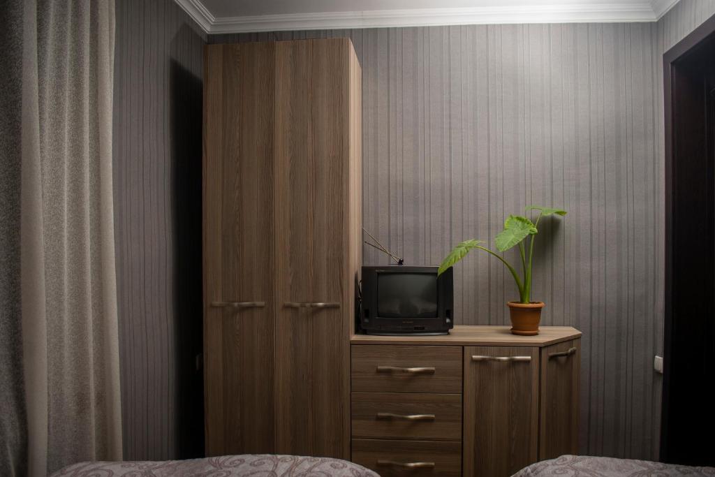 TV a/nebo společenská místnost v ubytování GNG Guest House