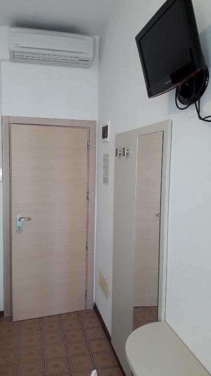 TV a/nebo společenská místnost v ubytování B&B - Meuble' - Hotel " CORDIALE "