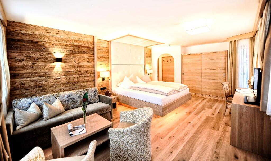 Postel nebo postele na pokoji v ubytování Salnerhof Superior Lifestyle Resort