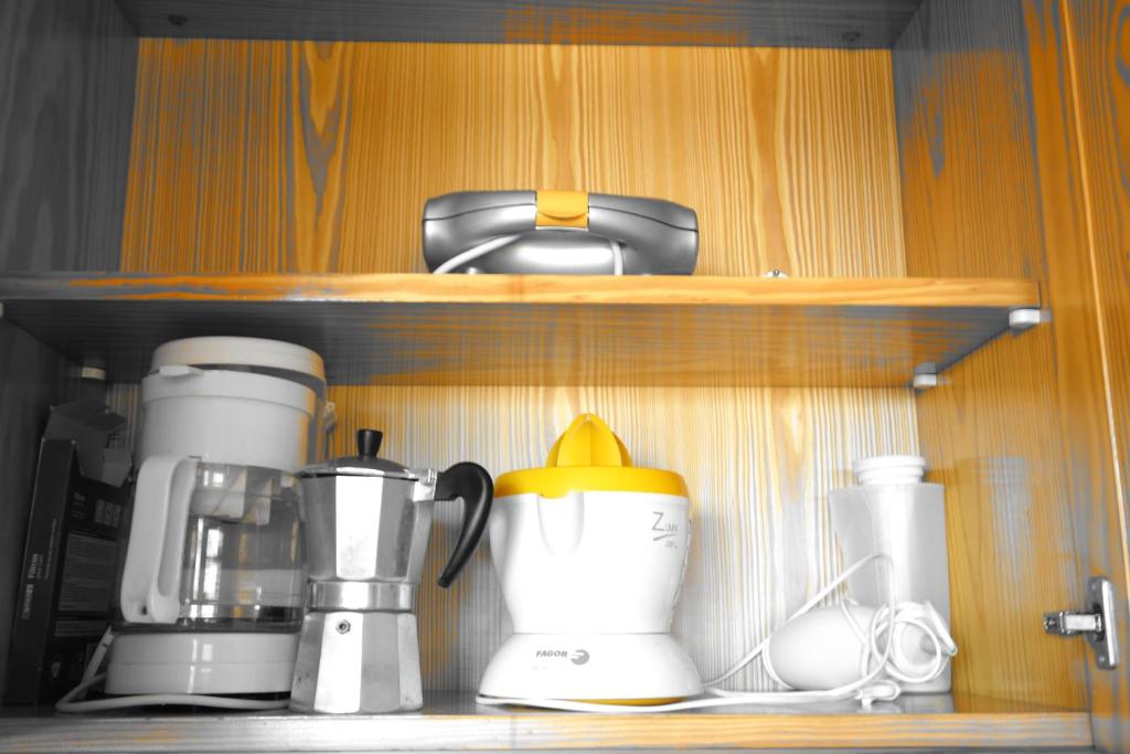 Kuchyň nebo kuchyňský kout v ubytování Apartamentos Nayara