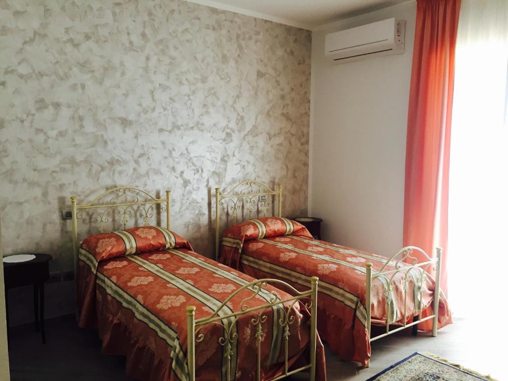 A bed or beds in a room at San Michele