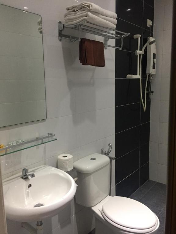 Koupelna v ubytování Ayer Hitam Hotel