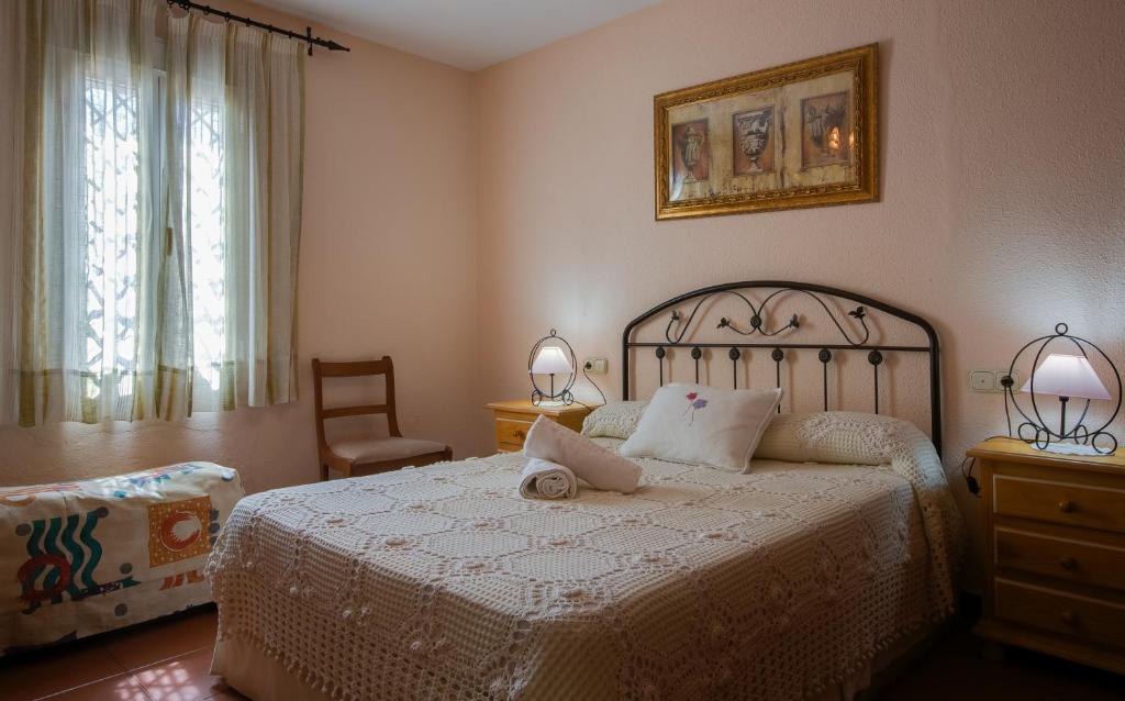Postel nebo postele na pokoji v ubytování Casa Rural el Canal