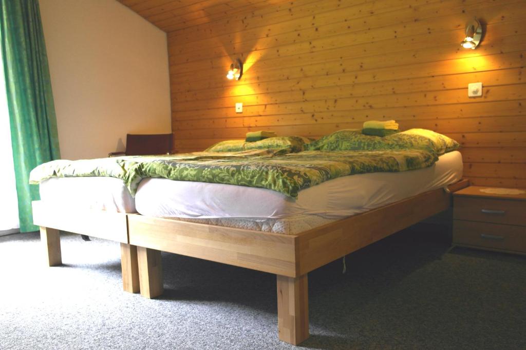 Postel nebo postele na pokoji v ubytování Hotel-Restaurant Stechelberg Bed & Breakfast