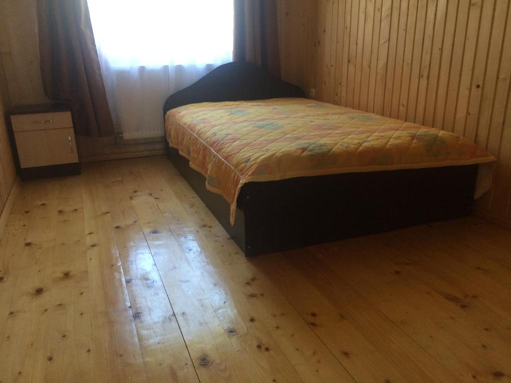 Postel nebo postele na pokoji v ubytování Mini Cottage