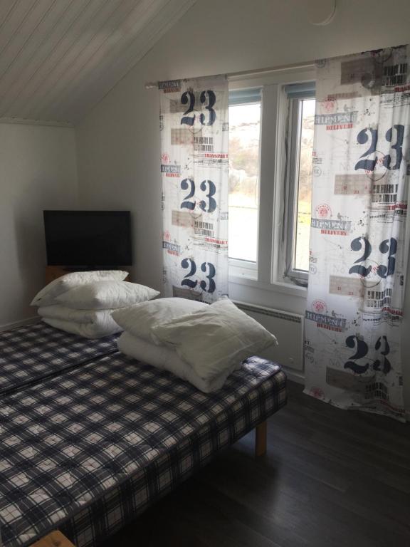 Voodi või voodid majutusasutuse Seaview Cottage Solvik - Kungshamn toas