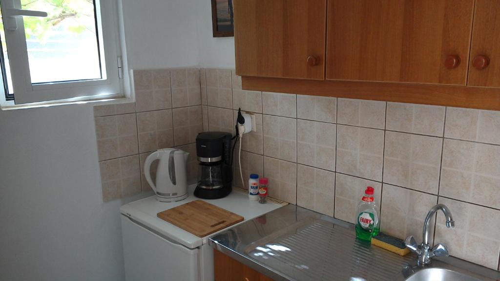 Kuchyňa alebo kuchynka v ubytovaní Vintage House-Vori-Rent Rooms