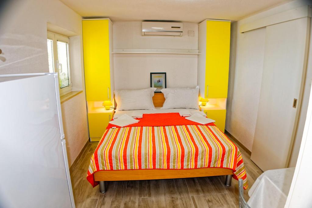 Postel nebo postele na pokoji v ubytování Studio Apartman Papić