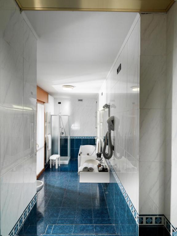 Fitness centrum a/nebo fitness zařízení v ubytování Hotel Al Pino Verde