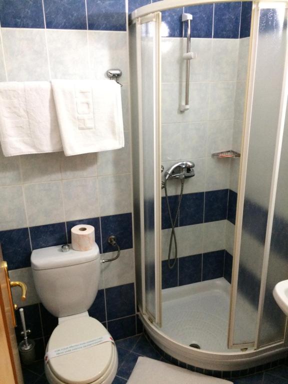 Koupelna v ubytování Hotel Cubic