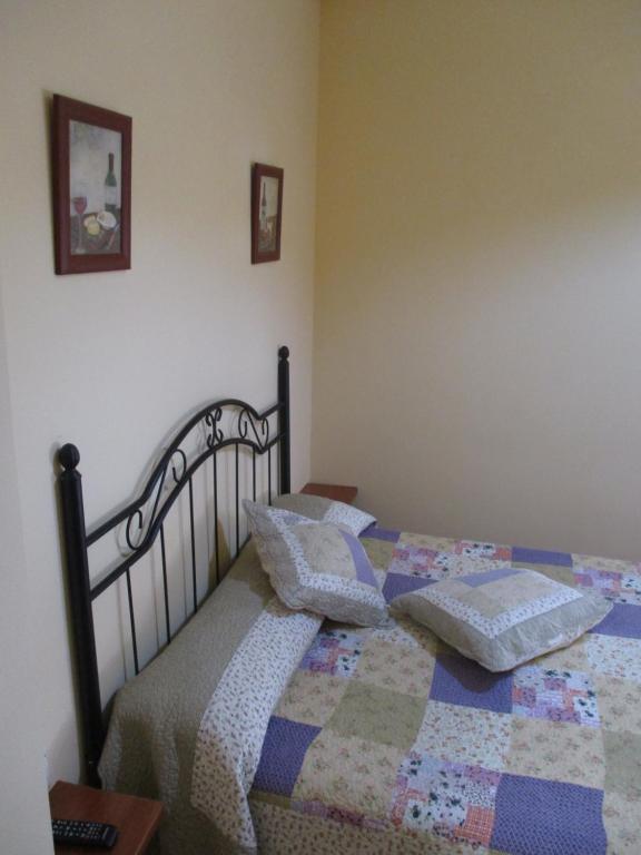 Postel nebo postele na pokoji v ubytování Hostal Becares