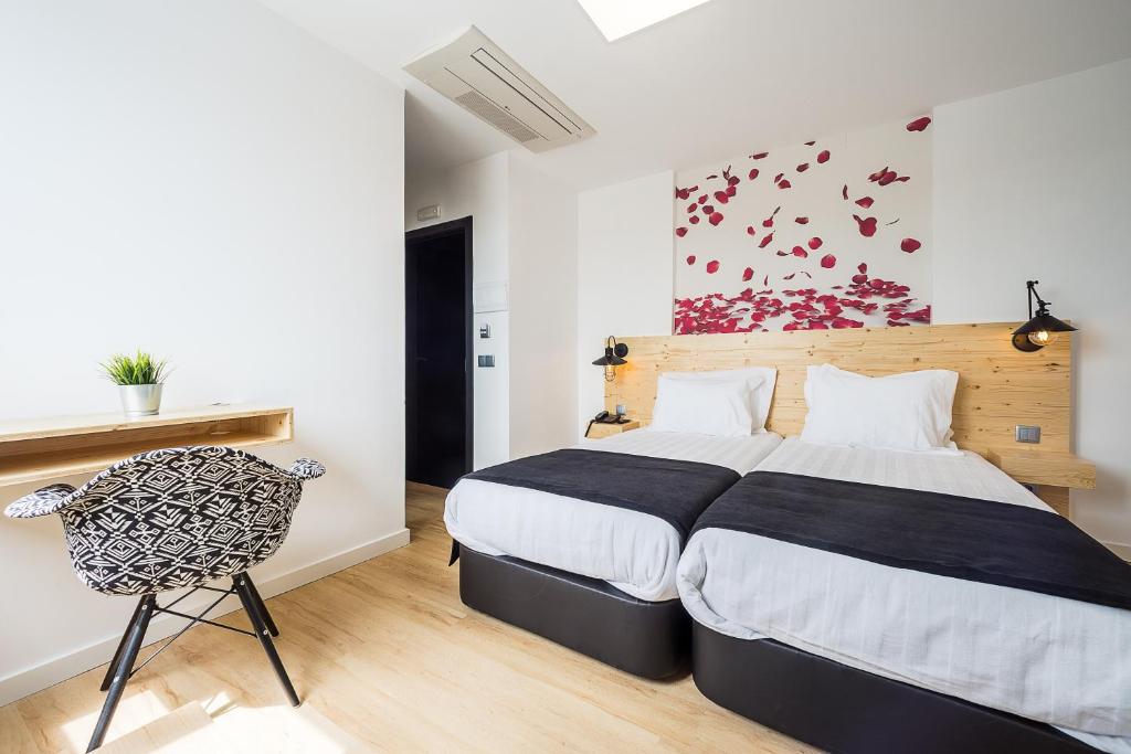Cama ou camas em um quarto em Hotel Santa Isabel