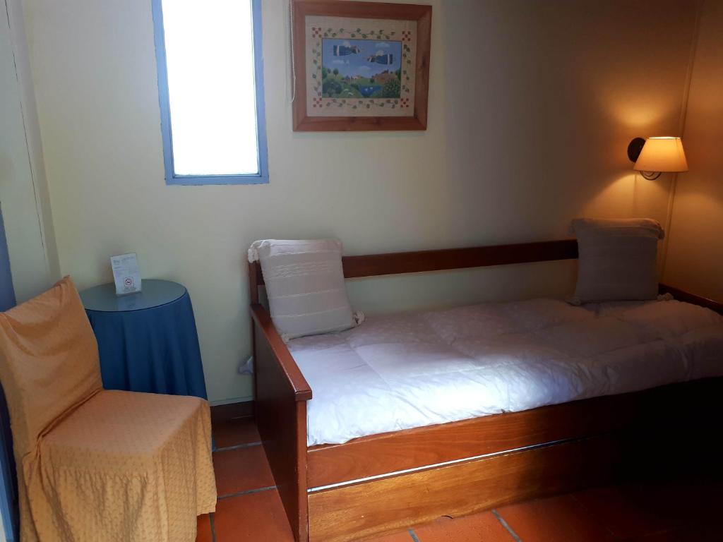 Postel nebo postele na pokoji v ubytování Posada del Angel