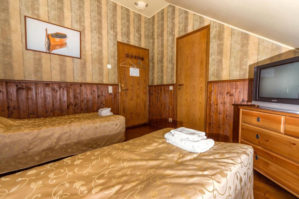 Postel nebo postele na pokoji v ubytování Viimsi manor guesthouse Birgitta