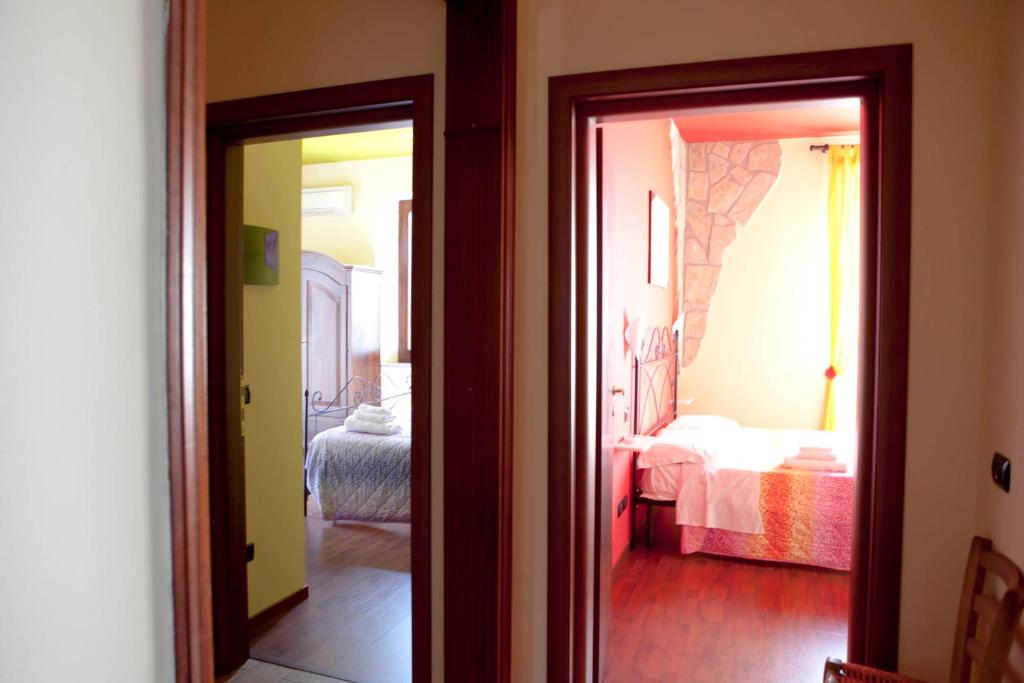 Postel nebo postele na pokoji v ubytování B&B Raffiori