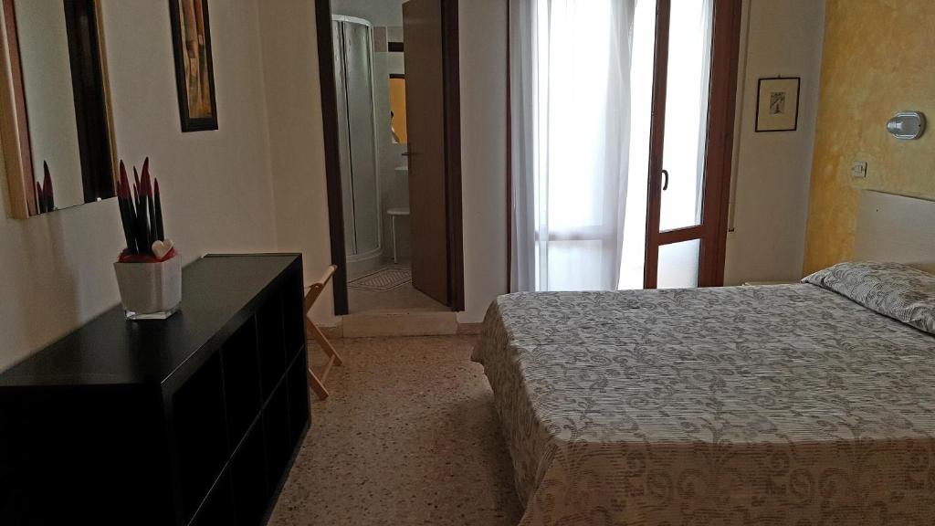Postel nebo postele na pokoji v ubytování Hotel Marietta