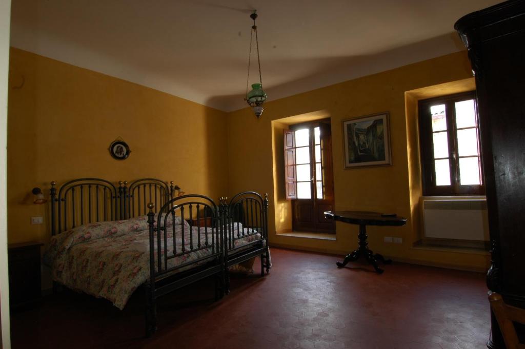 A bed or beds in a room at Bed and Breakfast Via Della Piazza