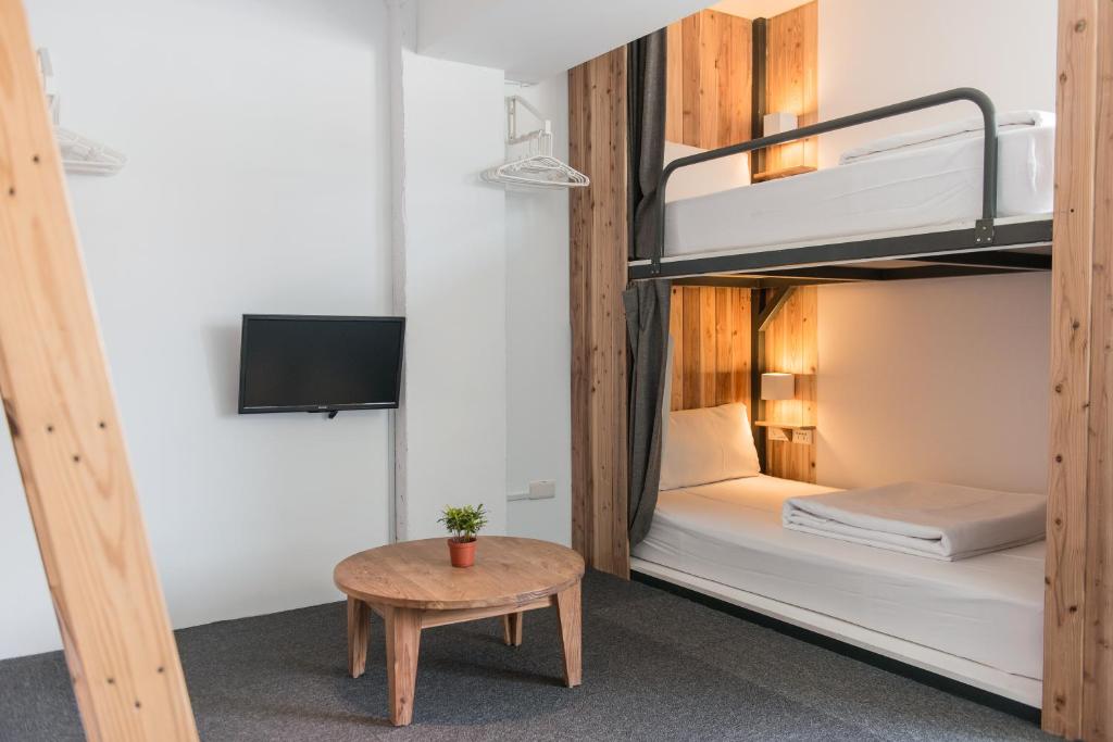 Postel nebo postele na pokoji v ubytování Star Hostel Taipei Main Station