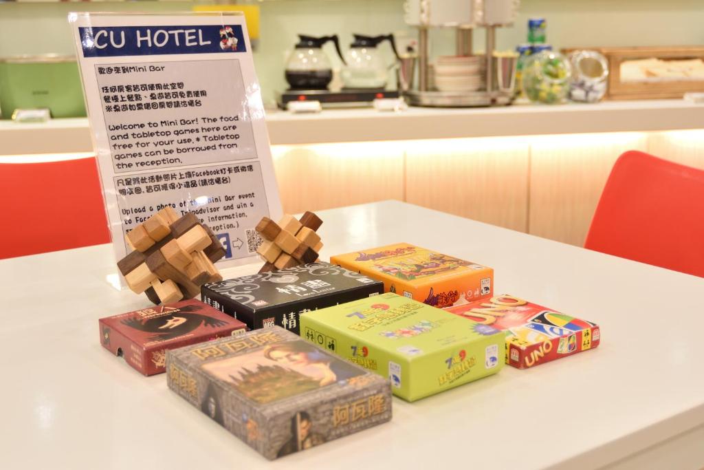 a table with a bunch of boxes on it at CU Hotel Taipei in Taipei