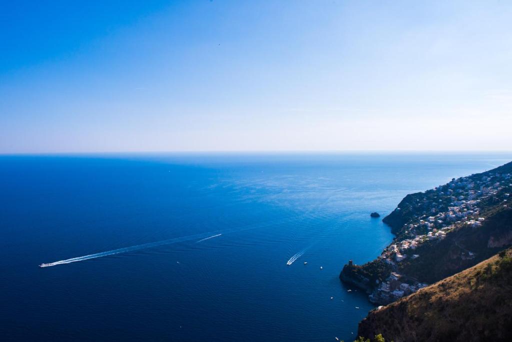 an aerial view of a large body of water at Le Contrade by Sosòre Holiday Homes -Amalfi Coast in Furore