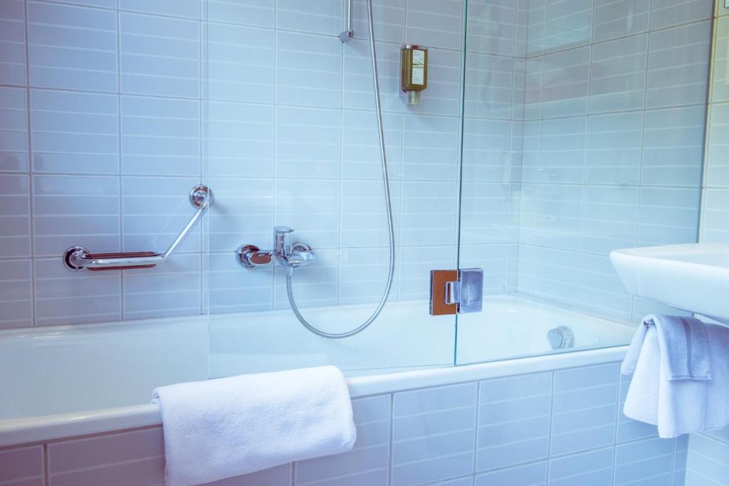 Koupelna v ubytování Hotel Weinstube
