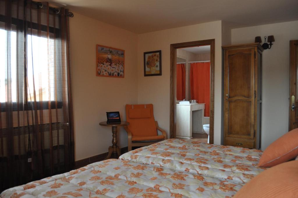 Postel nebo postele na pokoji v ubytování Hotel Langa