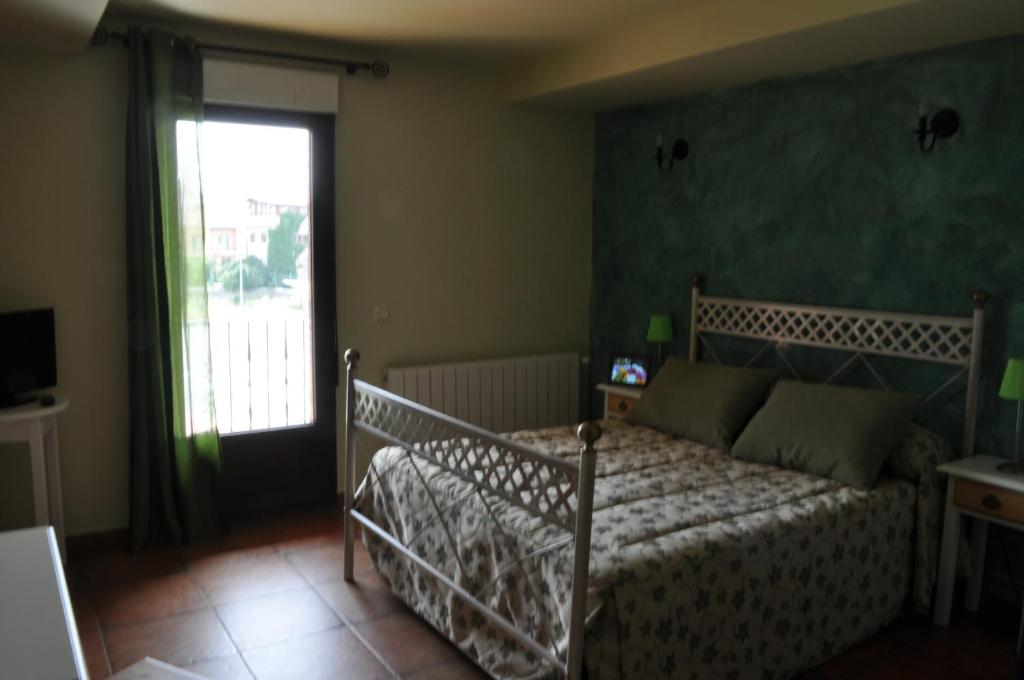 Postel nebo postele na pokoji v ubytování Hotel Langa