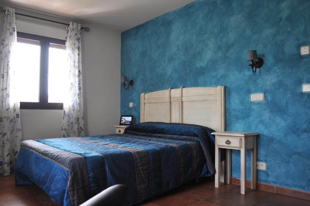 Postel nebo postele na pokoji v ubytování Hotel Langa