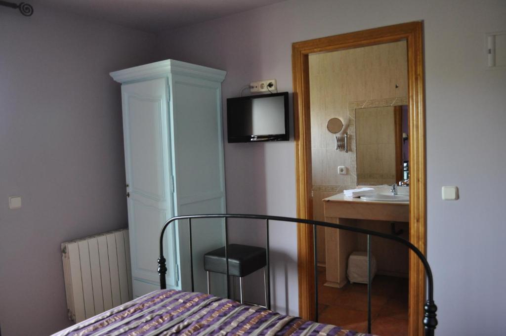 Postel nebo postele na pokoji v ubytování Hotel Langa