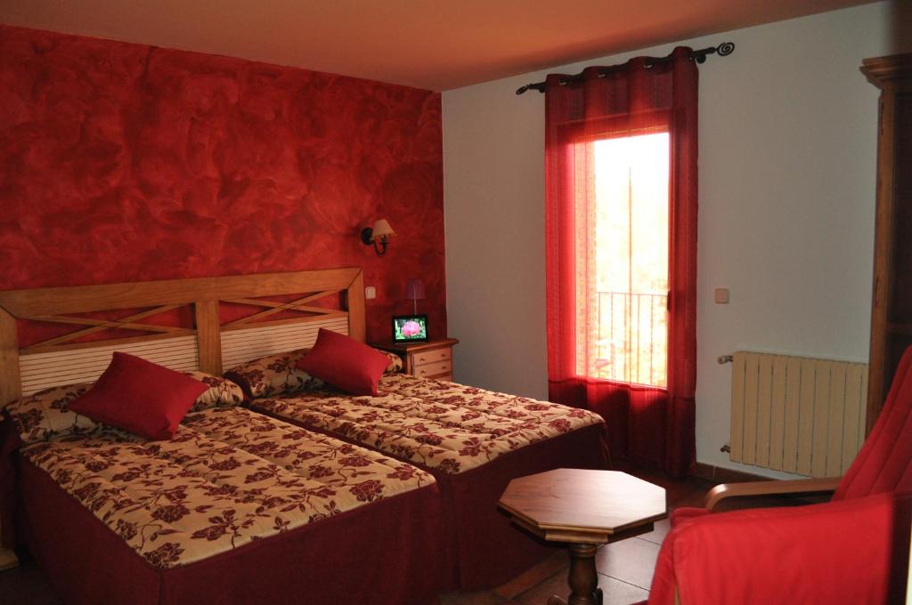 Postel nebo postele na pokoji v ubytování Hotel Langa