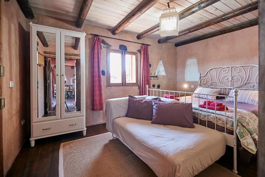 Posteľ alebo postele v izbe v ubytovaní Hubara Retreat