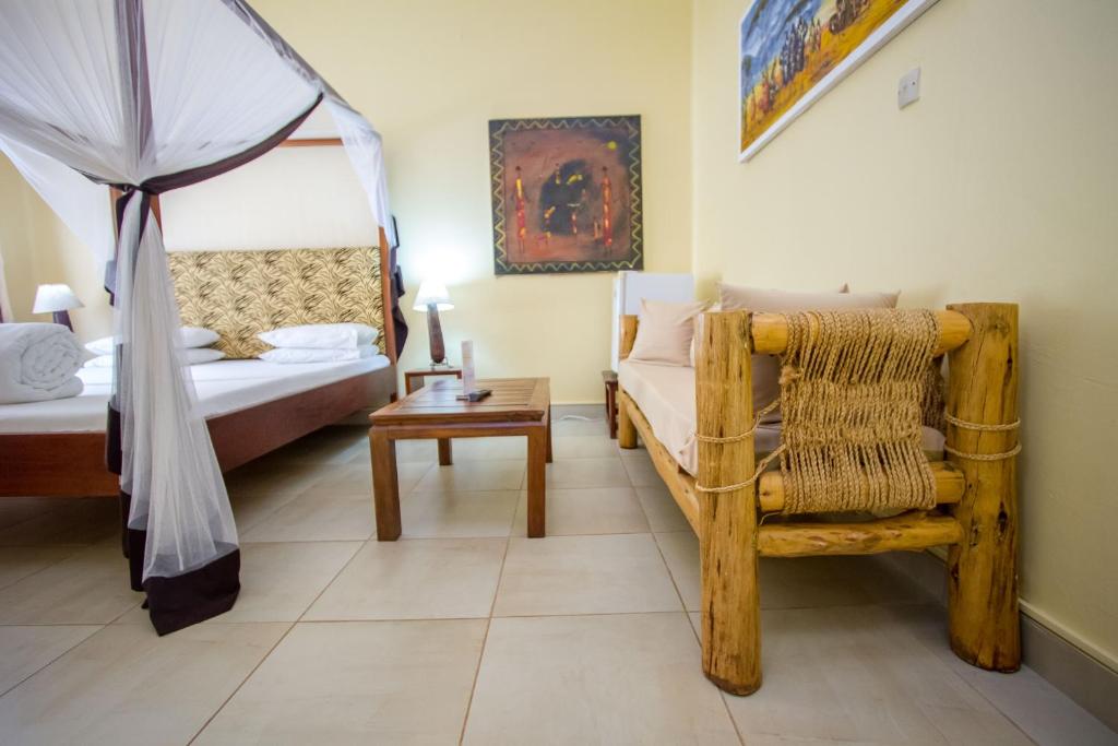 Postel nebo postele na pokoji v ubytování 2 Friends Guest House