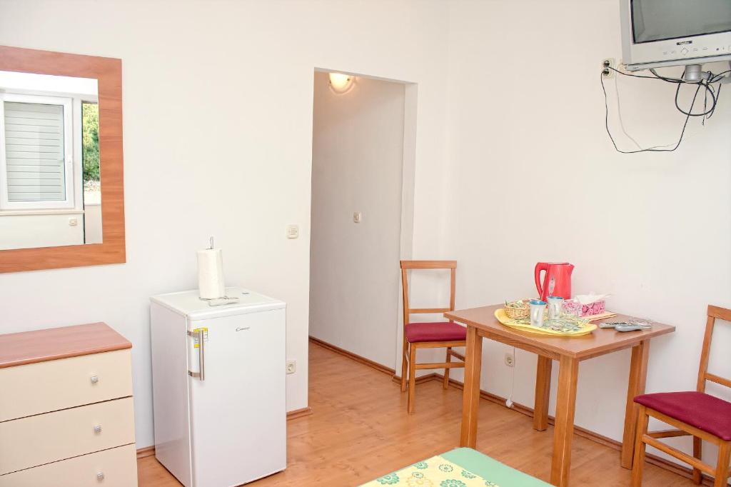 Kuchyň nebo kuchyňský kout v ubytování Apartments Dani