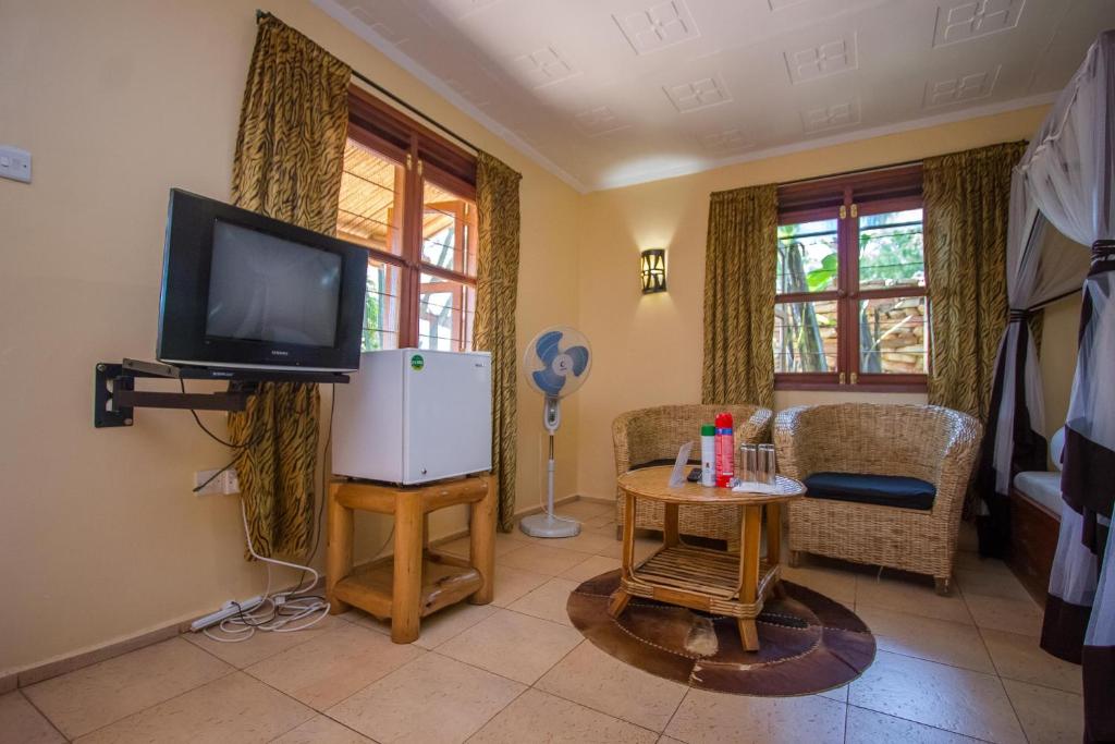 TV a/nebo společenská místnost v ubytování 2 Friends Guest House