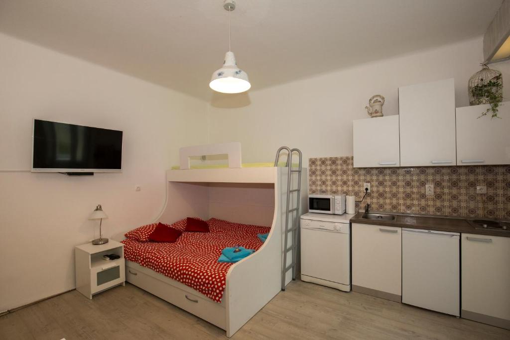Kuchyň nebo kuchyňský kout v ubytování Villa Lole