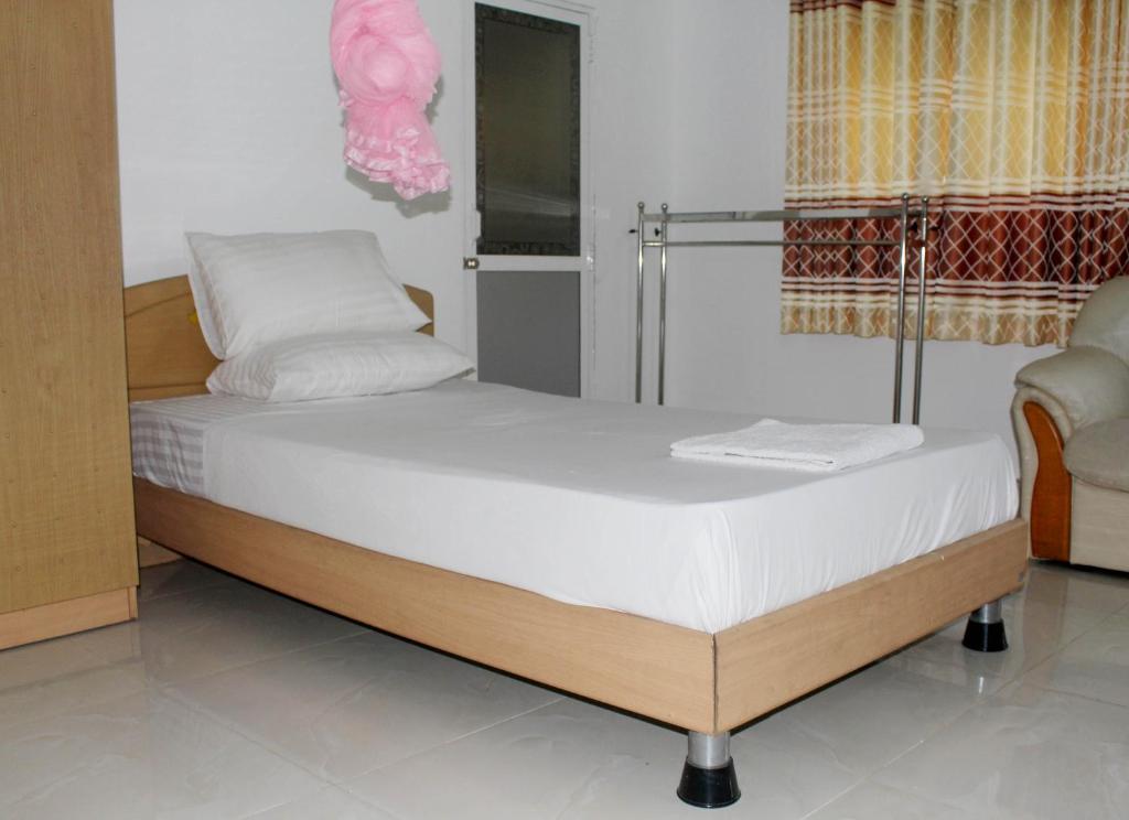 Postel nebo postele na pokoji v ubytování Fortune Rest Villa