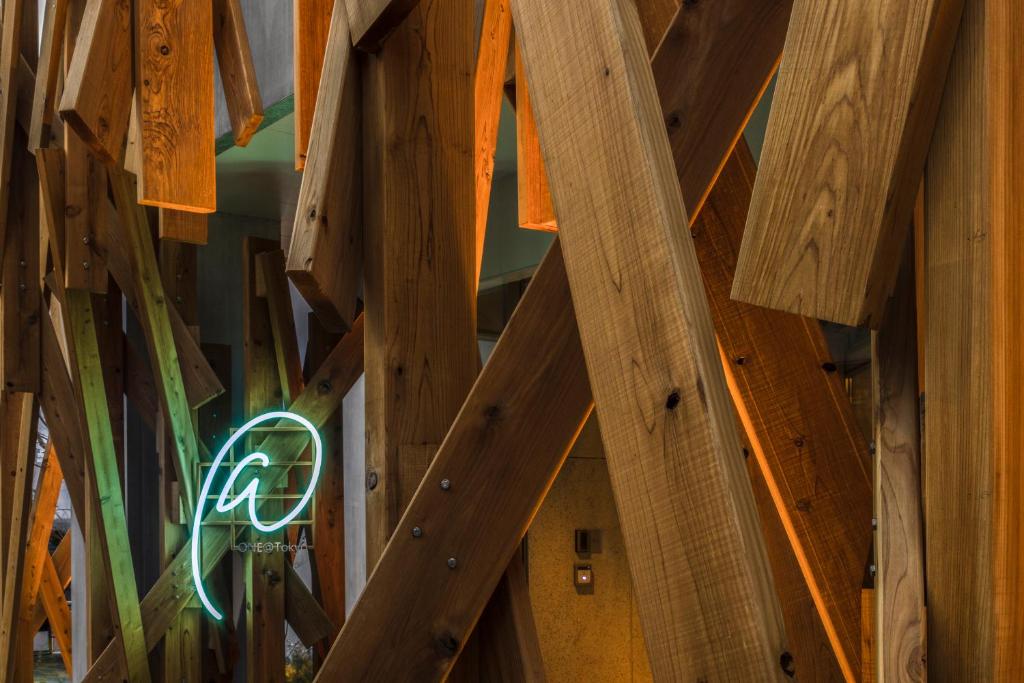 a view of the wooden ceiling of a building at ONE@Tokyo in Tokyo