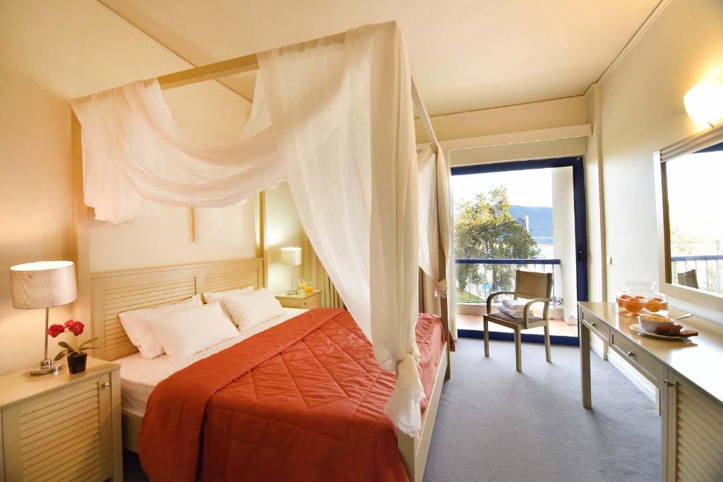 Postel nebo postele na pokoji v ubytování Ionion Star Hotel